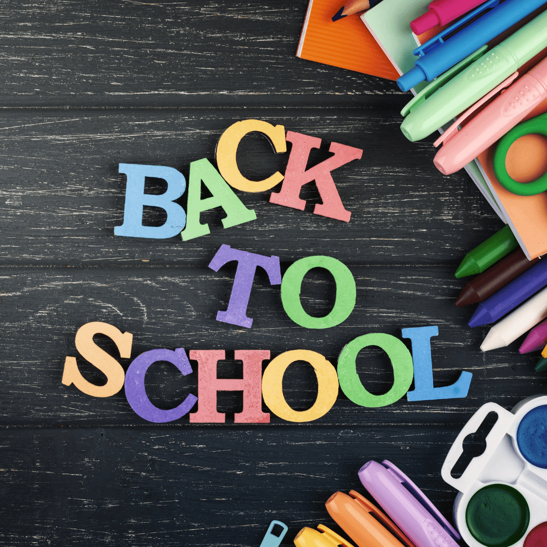 Colorful "Back to School" letters on a dark wooden background, surrounded by vibrant stationery, including pencils, markers, and paint, evoking excitement. Back-to-school tips for a smooth transition